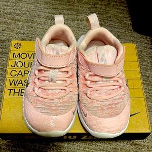 Light Pink Nike Free for toddlers.